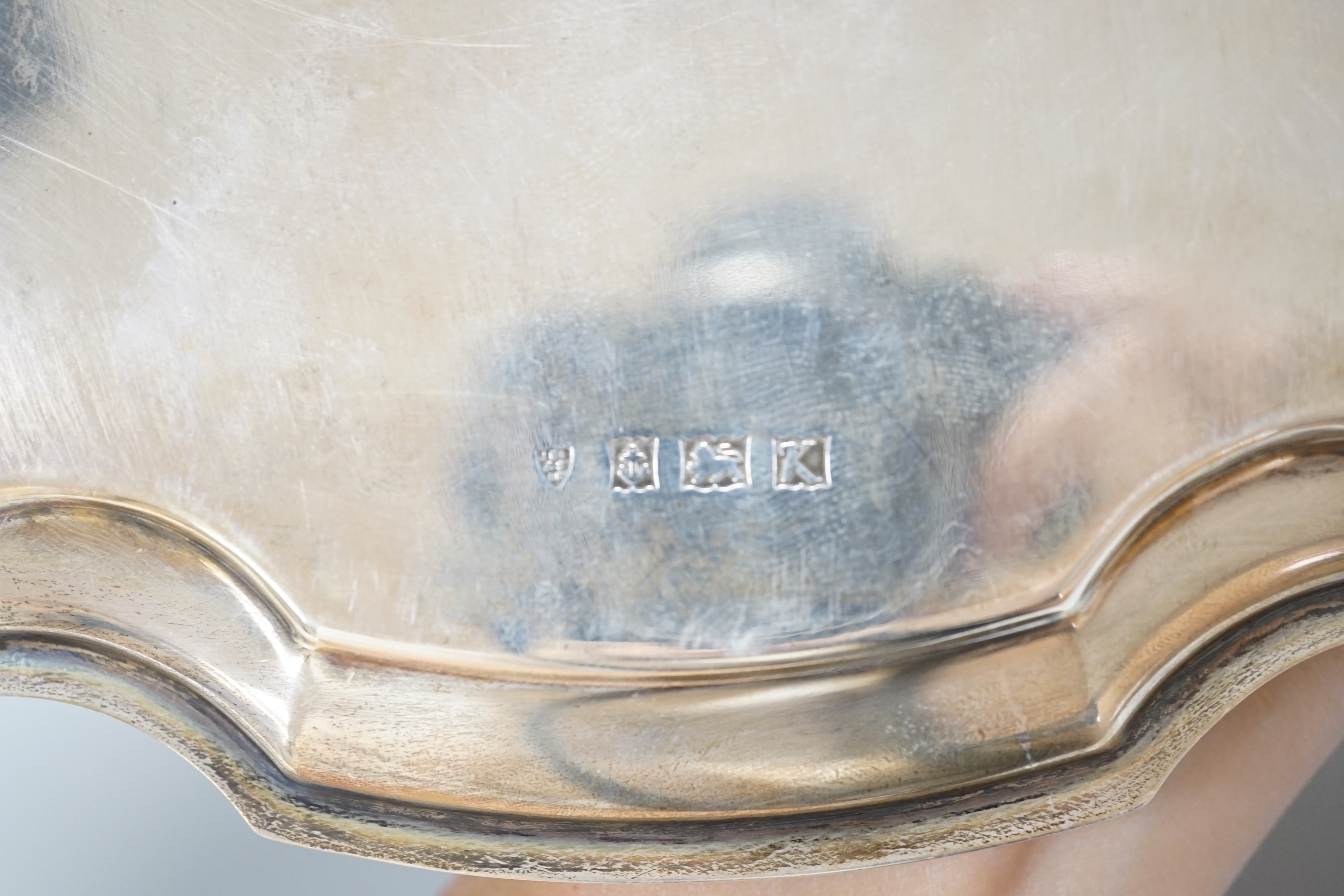 An Elizabeth II silver salver, with 1960 presentation inscription, piecrust rim and scroll feet, Birmingham 1959, 25.5cm, 516 grams